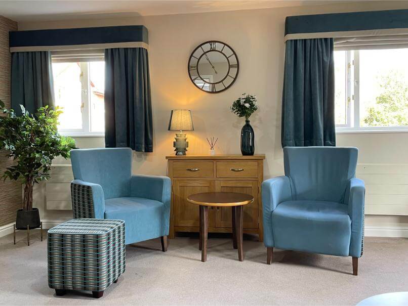 Two arm chairs in the Chailey Lounge at Lindridge Care Home